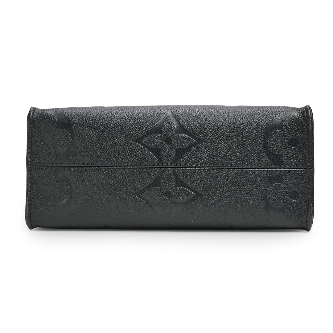 OnTheGo PM Monogram Empreinte Leather Handbag
