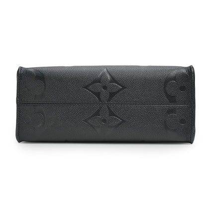 OnTheGo PM Monogram Empreinte Leather Handbag